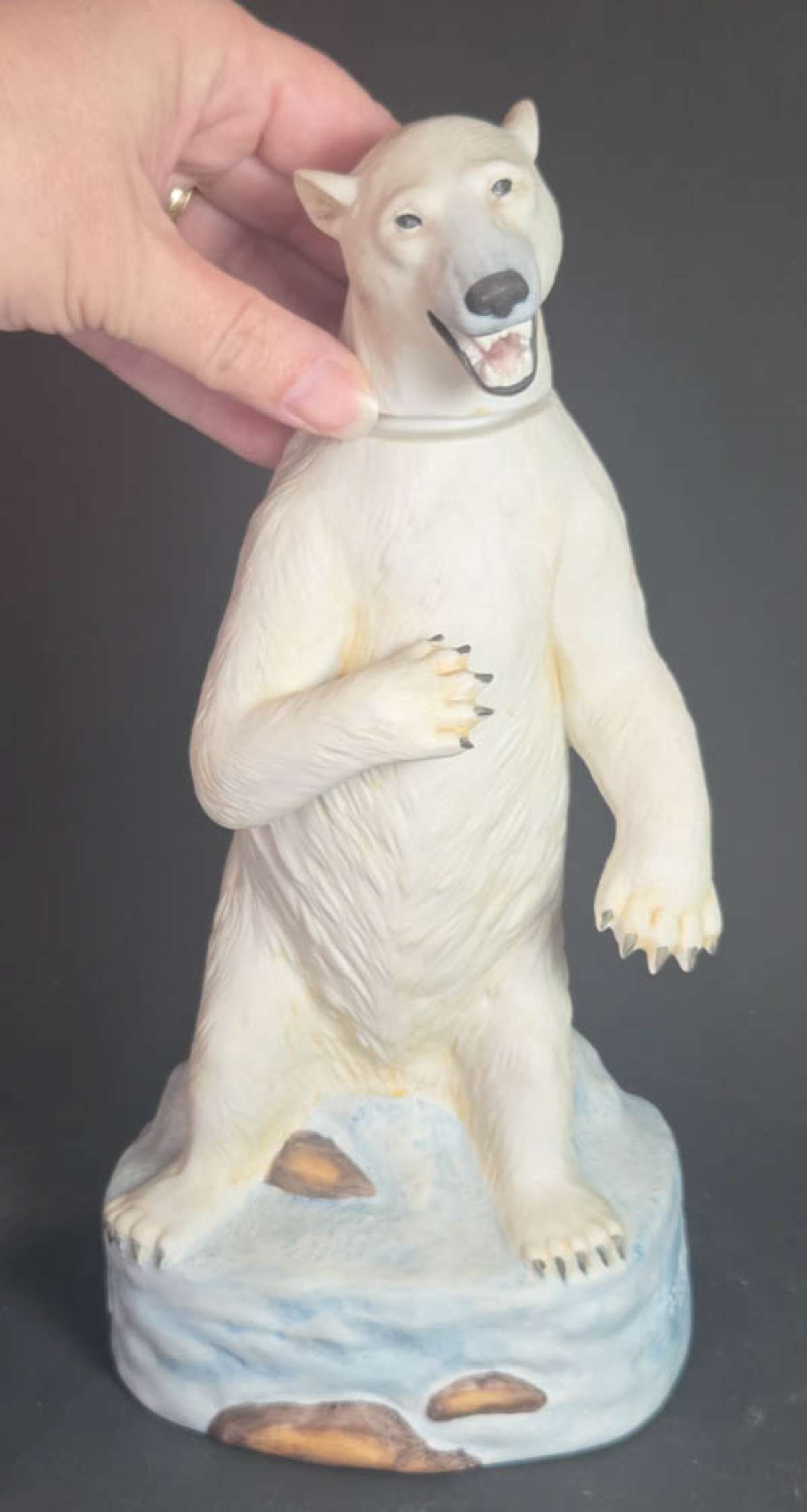 vintage figural animal liquor bottle: 25th anniversary Ski Country limited edition Alaskan Polar Bear 1984 decanter by Foss Company of Golden Colorado, made of bisque or porcelain and shaped like a polar bear reared up on its hind l