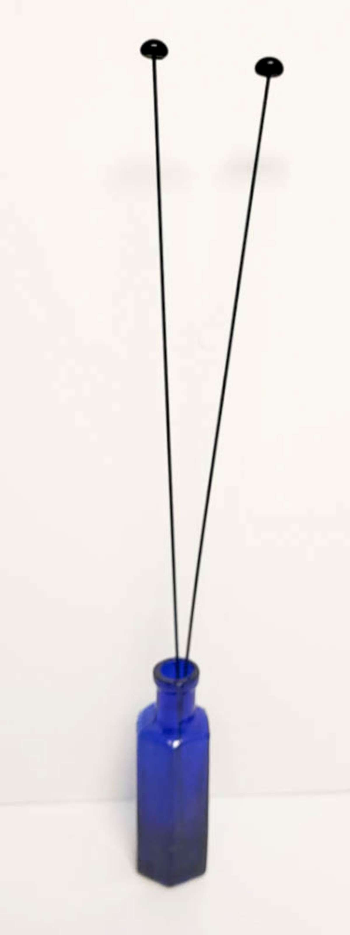 PAIR vintage long hat pins glass top: pair of vintage or antique hat pins, each with black glass cap and long metal pin
