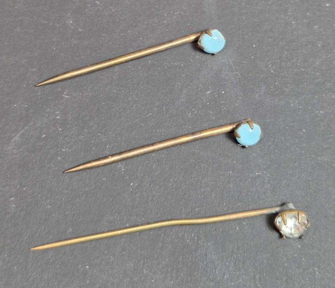 THREE antique Victorian hat pins: antique, turn of the century pins, consisting of a single pin with paste diamante or clear cut rhinestone stone and also a matching pair of pins with Turquoise blue glass(?) stones longest