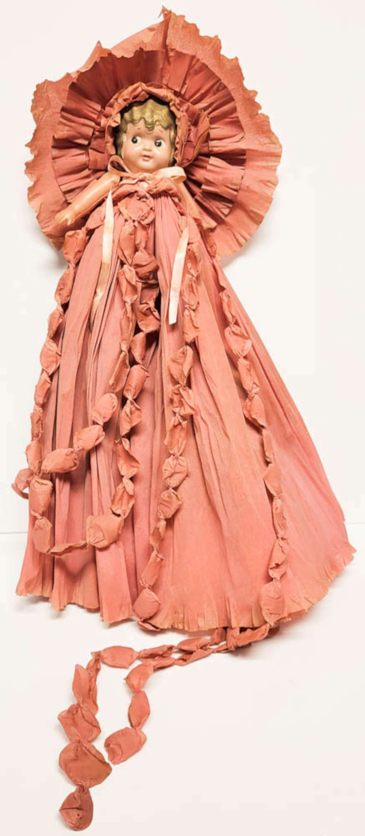 antique celluloid doll in paper dress: adorable Googly or Flirty Eye celluloid doll with gold/blonde painted moulded hear ad in an elaborate dusty pink paper gown or dress and bonnet