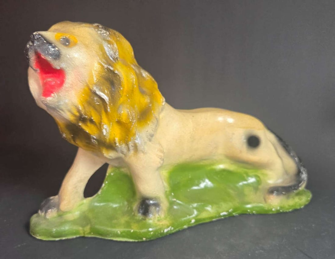 vintage chalkware animal: vintage or antique carnival prize, hand painted and shaped like a roaring lion about 13" long