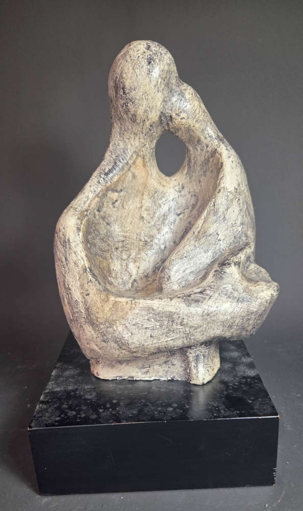 vintage Modernist sculpture: MCM style Brutalist or Abstract chalkware mother and child or baby statue on black base, unmarked base about 6 5/8" squared by 12" high