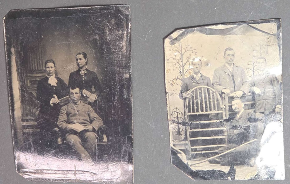 pair antique tintype photographs: set or lot of two ca. 1890's tintype photographs, both black and white portraits of families, the first of two women standing behind a seated young man, the second depicting 4 m