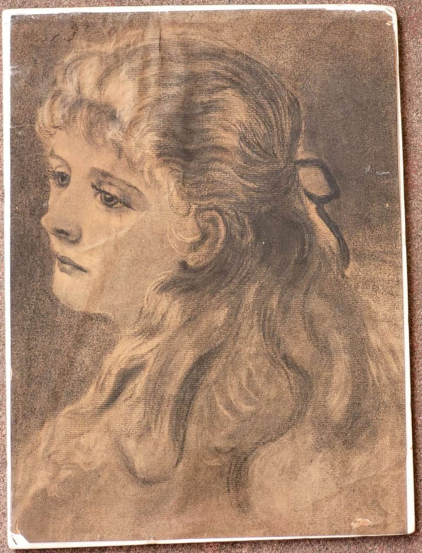 original illustration girl portrait drawing: original charcoal or chalk drawing depicting a young woman with wavy long hair looking to the left, unsigned and on paper in shrink wrap on a white board backing back board about 10 3/8" wi