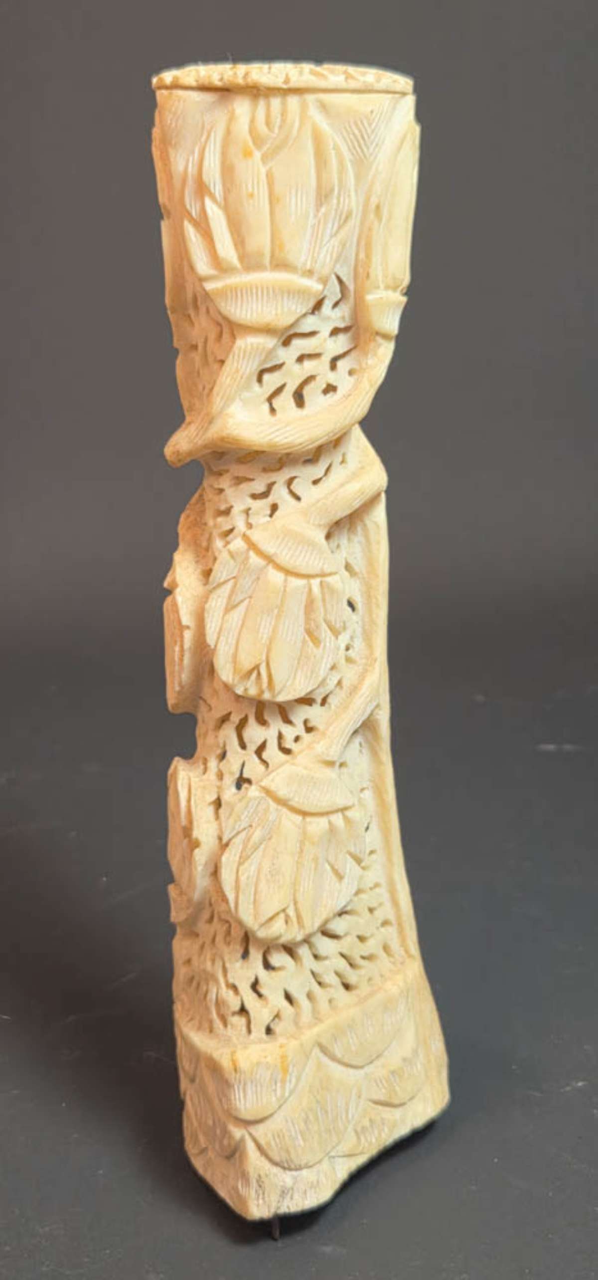 antique carved bone floral object: antique carved bone (consignor suggested Camel, but please see all pictures and judge for yourself before bidding?) hollow object with abstract floral design - possibly Lotus or Waterlily and wi