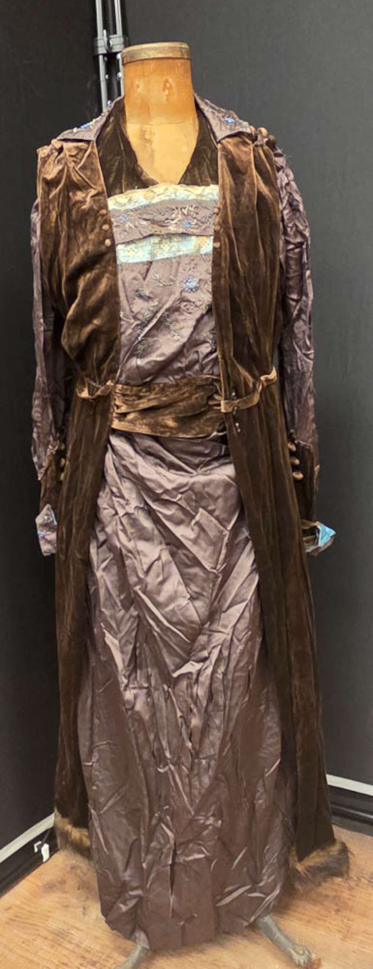 antique Art Deco Flapper Era dress: vintage or antique ca. 1920's long ladies' dress with velvet and embroidered and beaded lace and silk fabrics with buttons, layered with a double "flap" design, sash be