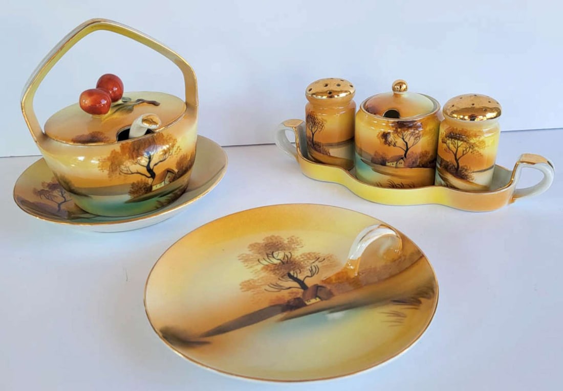 antique Japanese Noritake condiment set: fabulous porcelain antique Noritake hand painted set, consisting of a handled bonbon dish, a jam or jelly bowl with underplate, spoon and fruit covered lid and a condiment set on und