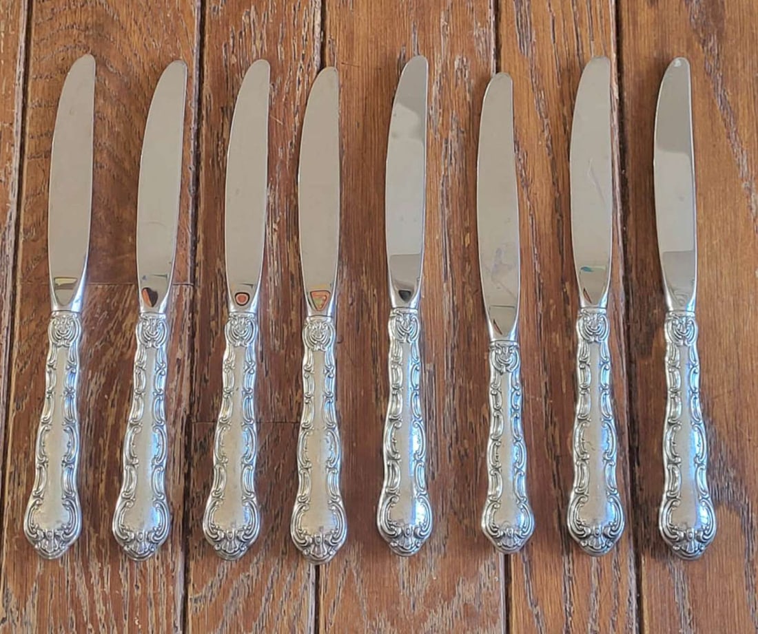 Sterling silver Gorham flatware - knives: antique set of 8 marked Sterling Gorham dinner knives with elaborate handles and stainless steel blades, NOTE: one knife is slightly shorter than the others total weight is 590 grams Info from