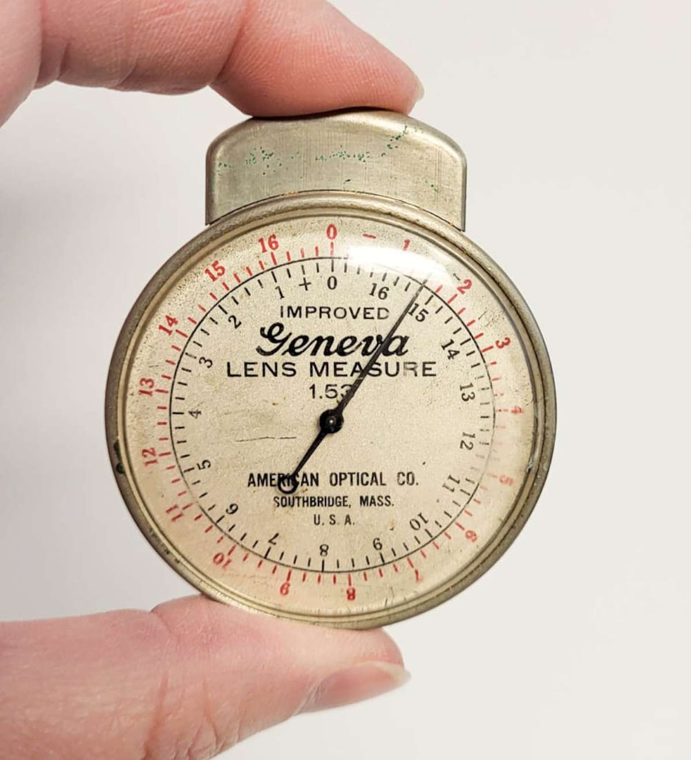 vintage optometrist tool: vintage Improved Geneva Lens Measure by American Optical, measures the curvature of the lens surface
