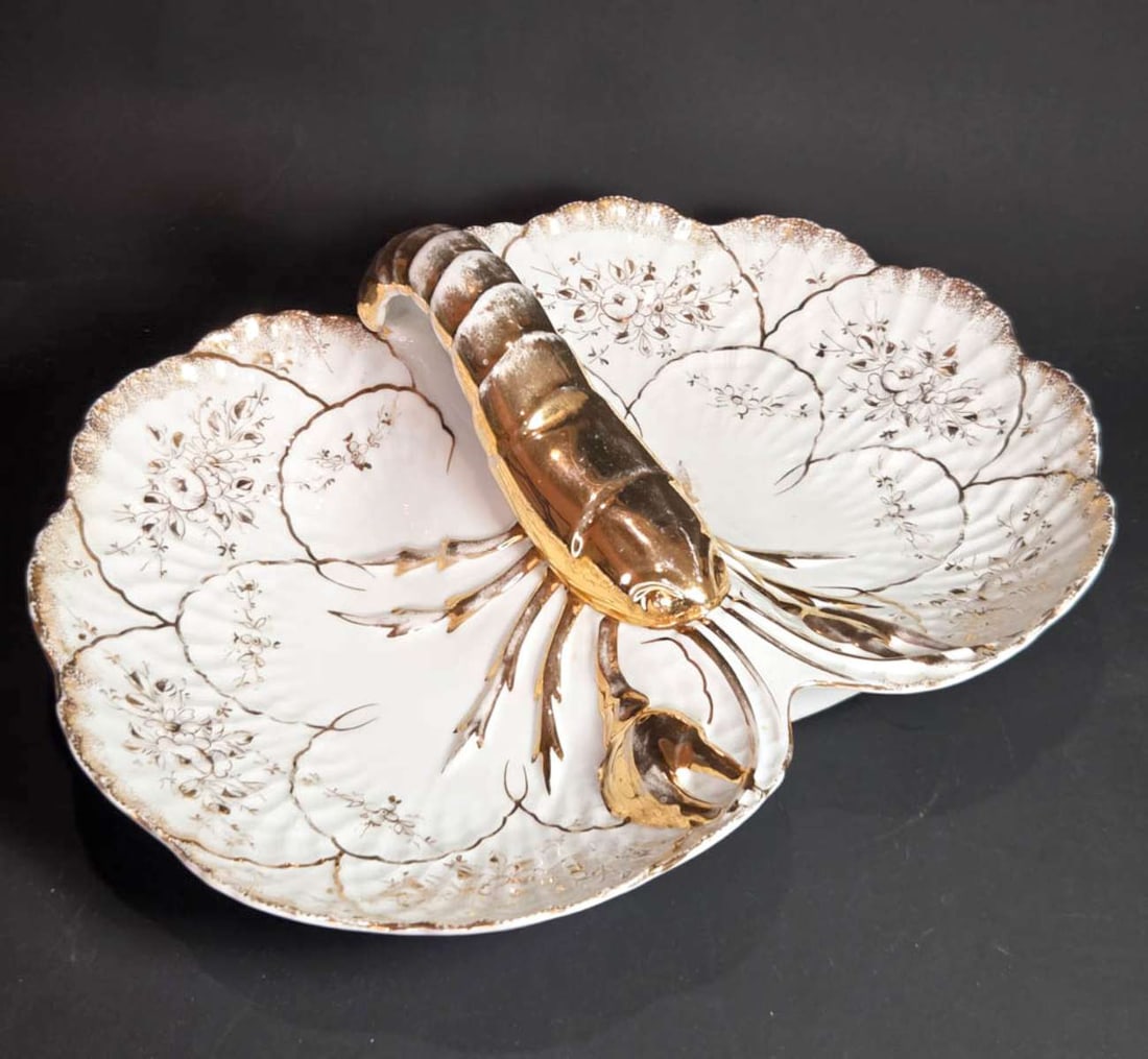 antique lobster serving platter: large antique white porcelain serving dish with central gilt lobster handle design, unmarked about 14 1/4" wide by 4 3/4" high
