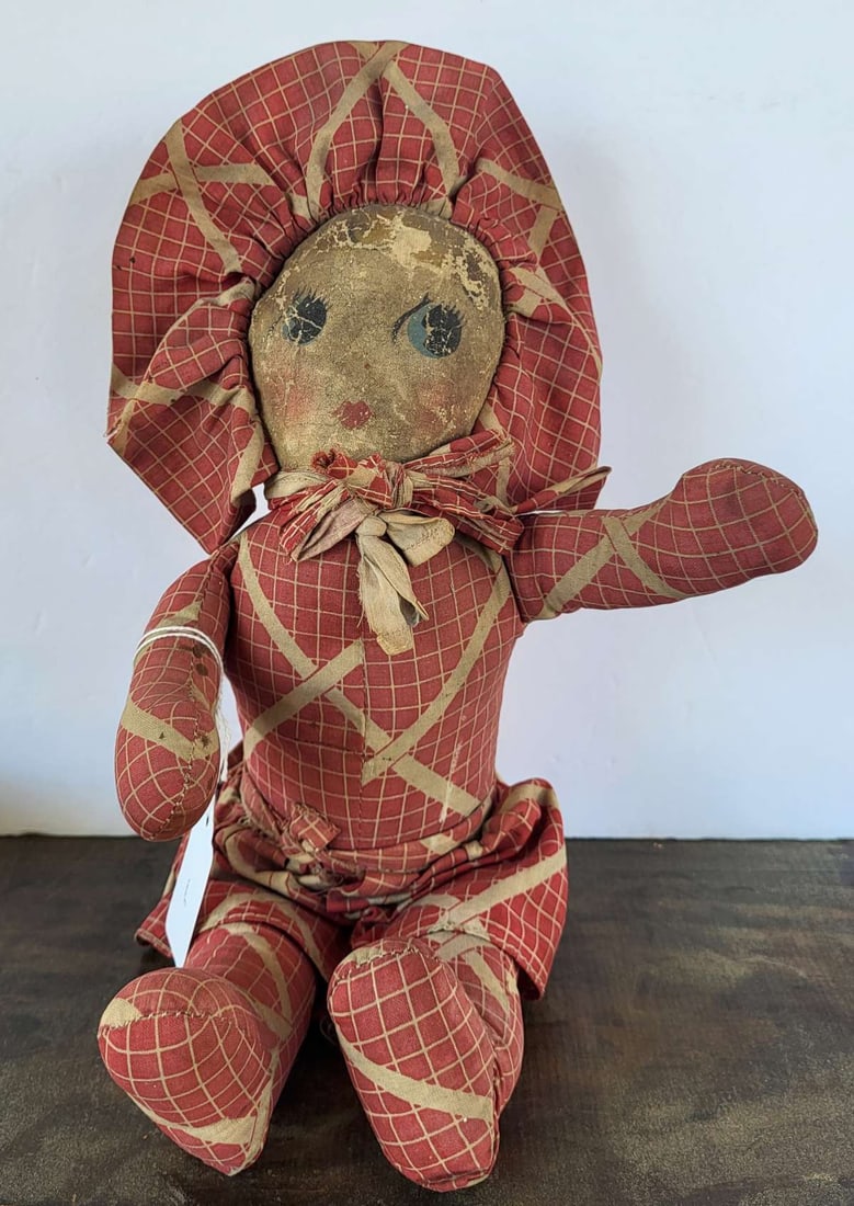 antique Folk Art oil cloth doll: vintage or antique rag doll type doll with oil cloth or varnished fabric face with hand painted features 14 3/4" tall with her bonnet up