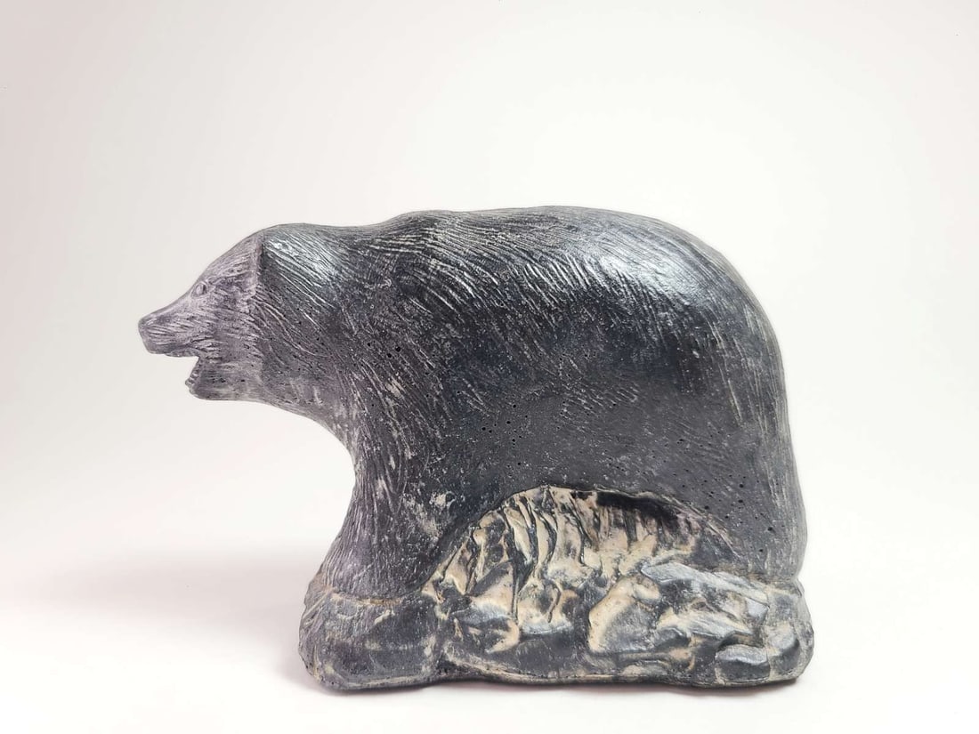 vintage Canadian figural animal statue: paper label underneath as shown The Wolf Sculptures, cute small bear statue with great facial detail about 1 1/2" wide by 4" long Info from online search: "They are molded from a 