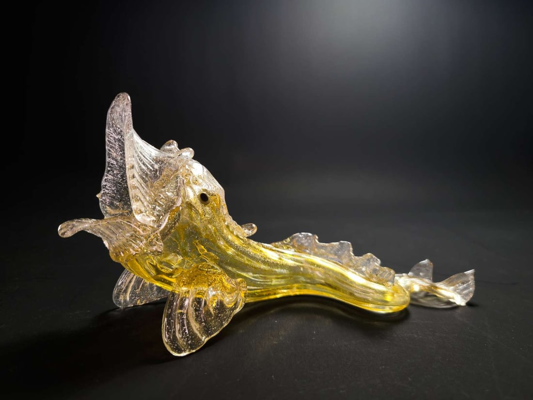 vintage Murano glass figural animal statue: vintage figurine made of iridescent gold flecked pulled glass and shaped like a Dolphin or other fish, mouth open and actually hollow so you can use it to display flowers or.......unmarked but c