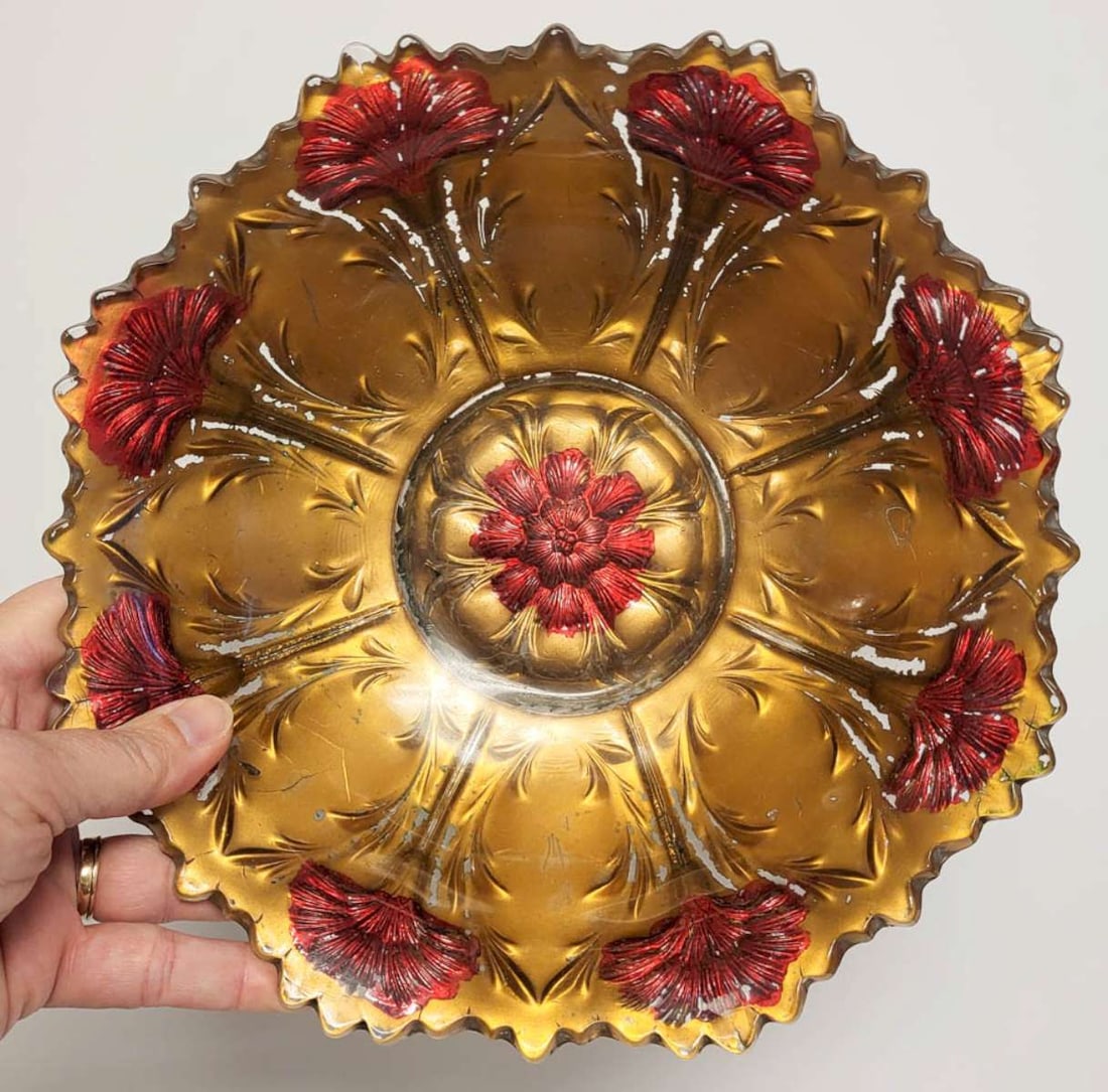 Victorian Goofus glass bowl: antique pressed glass dish or bowl with gold and red painted floral or Carnation flower design with a sawtooth edge about 9 1/4" diameter Info from online search: "Goofus glass is an America