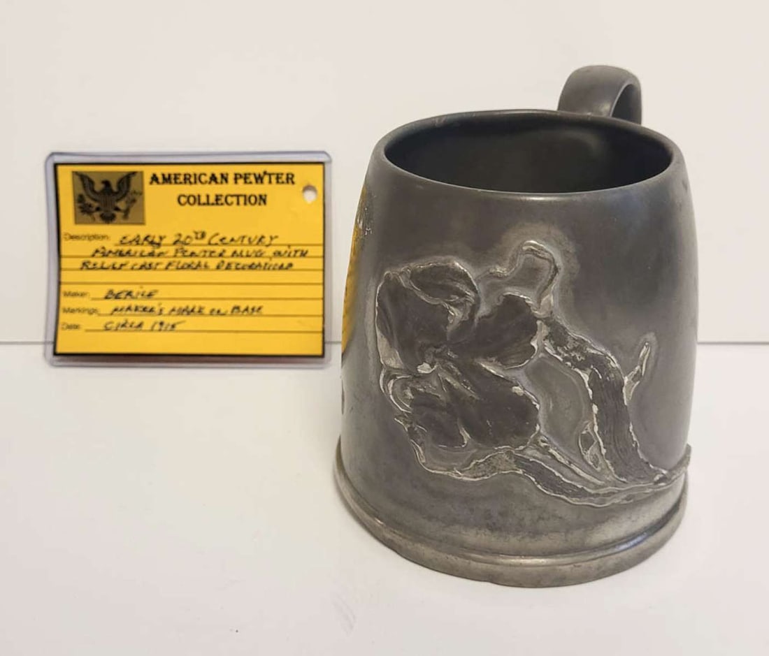antique American pewter handled tankard: this mug or handled cup has an Art Nouveau design and is marked as shown underneath with a number and the (included) original dealer's card suggests it's an American piece from ca. 1915 and 