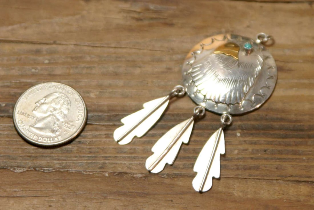vintage estate jewelry: Native American necklace pendant: Old Pawn Native American Indian unmarked (but most likely silver, if not even Sterling) necklace pendant with dangly abstract feather design and central body with Eagle or other bird with gold t