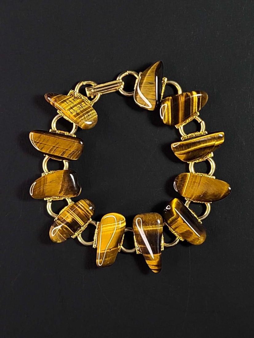 vintage estate jewelry: gemstone bracelet: gold toned (unmarked) bracelet with teardrop shaped high polish chunks of Tiger's Eye or other stone about 7 1/4" long overall