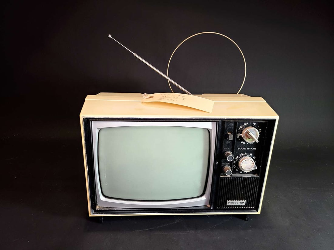 working vintage Philco Ford television: turns on and antenna pulls out, this is a vintage 1972 Philco Portable CRT TV with a beige plastic case (heavy!) with glass 8 inch TV screen aprox. 12" wide by 8 1/2" high by 8 1/2&quo