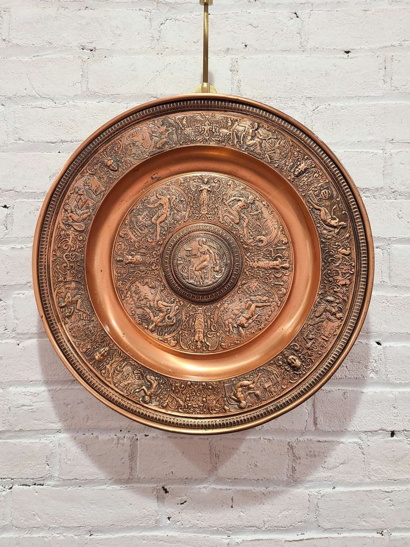 huge antique copper charger plate in relief: antique 1800's copy of French artist Francois Briot's (ca. 1550 - 1615) cast relief charger or basin plate with Renaissance and allegorical figural scenes including nude women and Cherubs