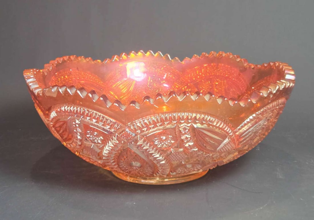 vintage Imperial Carnival glass bowl: vintage or antique Marigold bowl with hobstar and diamond pattern in an iridescent orange color about 10 1/4" in diameter by 4 1/4" tall