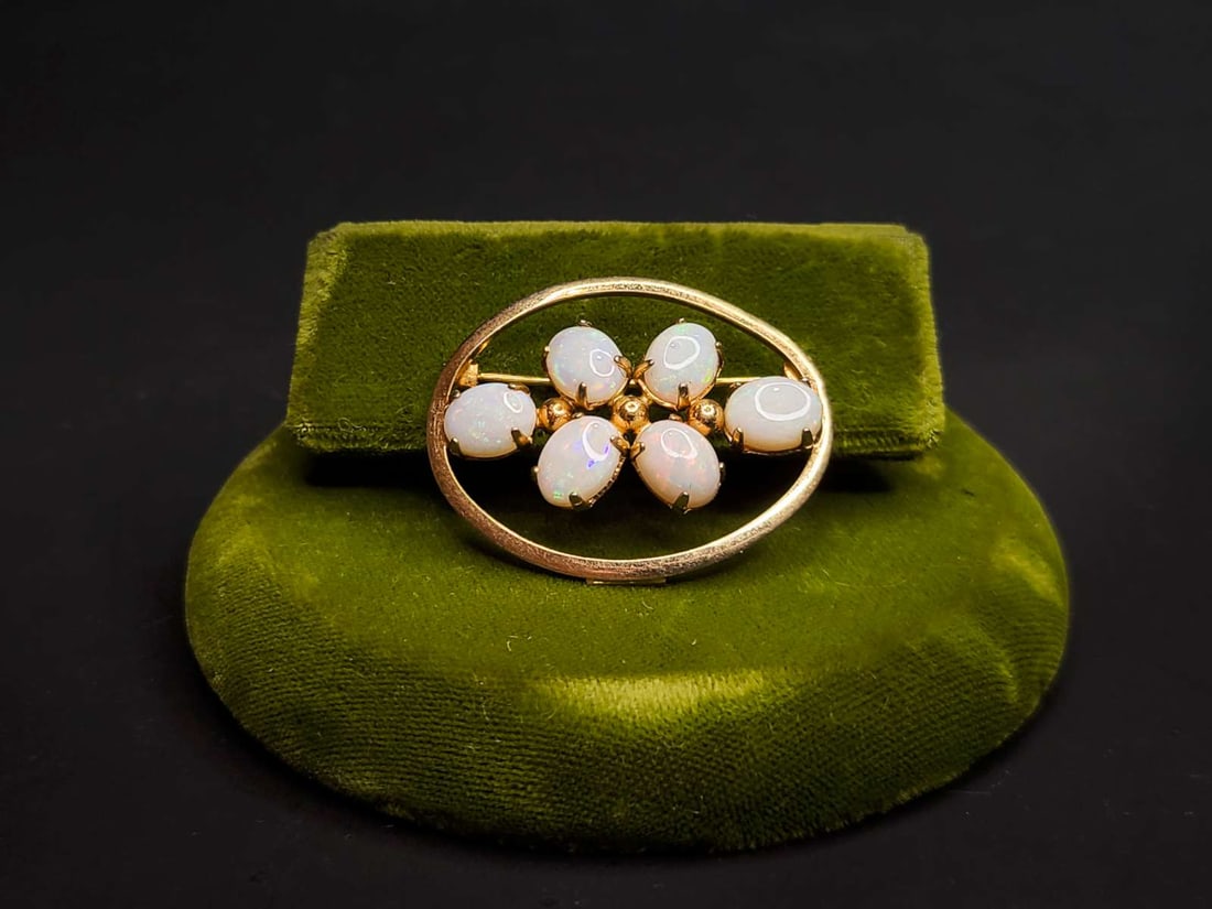 antique estate jewelry: gold Opal brooch: antique Victorian Era 12k gold filled pin brooch with 6 oval shaped inlaid cabochon style Opal stones about 1" high by 1 1/4" wide