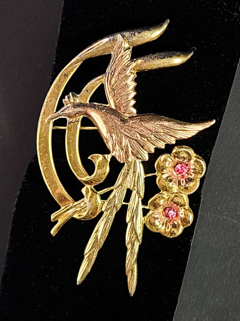 vintage estate jewelry: bird brooch pin: vintage yellow and red gold toned large pin brooch with Phoenix bird design and cut pink glass stones in the flowers, about 3" high by 1 7/8" wide