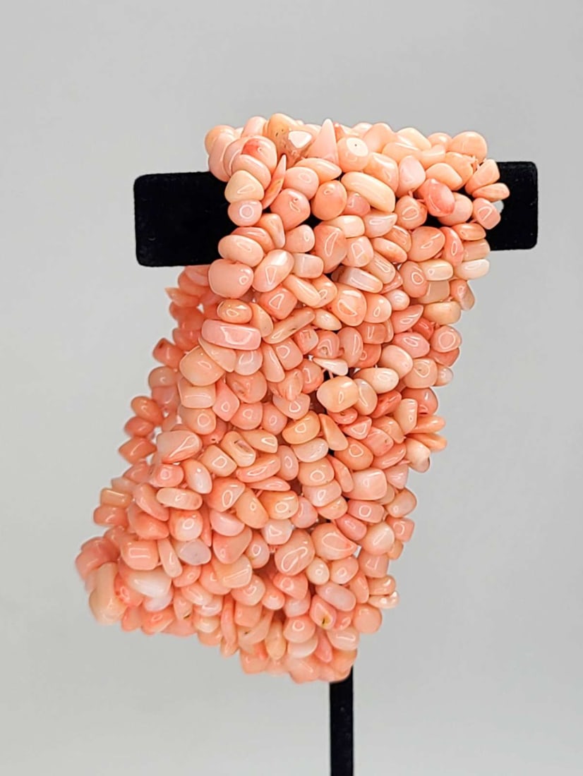 vintage estate jewelry: pink Coral bracelet: vintage stretch bracelet with multistrand wide cuff style and beautiful pink Coral beads with natural color variations about 3 1/4" inside diameter by almost 2" wide