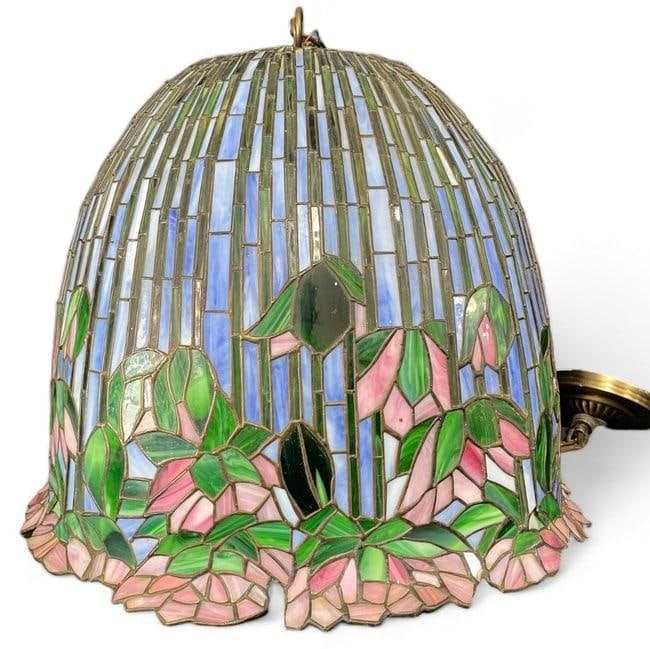 Pendant Stained Glass Lamp in the Style of Tiffany: Illuminate your space with this stunning pendant stained glass lamp, featuring a classic lotus motif in the timeless Tiffany style. Additional Description Style: Tiffany Materials: Stained Glass, Copp