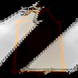 Friedman Brothers Decorative Arts New York Carved Giltwood Gesso Rococo Wall Mirror: Brand: Friedman Brothers Decorative Arts New York Materials: Carved Giltwood and Gesso Color: Gilt Item Type: Rococo Style Wall Mirror Design Features: The mirror features an elegantly