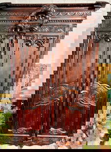 Carved French Louis XV Style Wedding Armoire Early 19th Century: Brand: Unbranded Materials: Wood Color: Brown oak Item Type: Armoire Design Features: This exquisite French Louis XV style wedding armoire, dating from the early 19th century, features richly