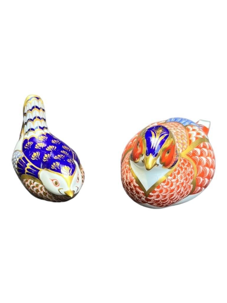 Royal Crown Derby Decorative Porcelain Birds - Set of 2: Brand: Royal Derby Materials: Porcelain Color: Red/Blue/Gold Item Type: Decorative objects Design Features: Beautiful pair of birds with gold