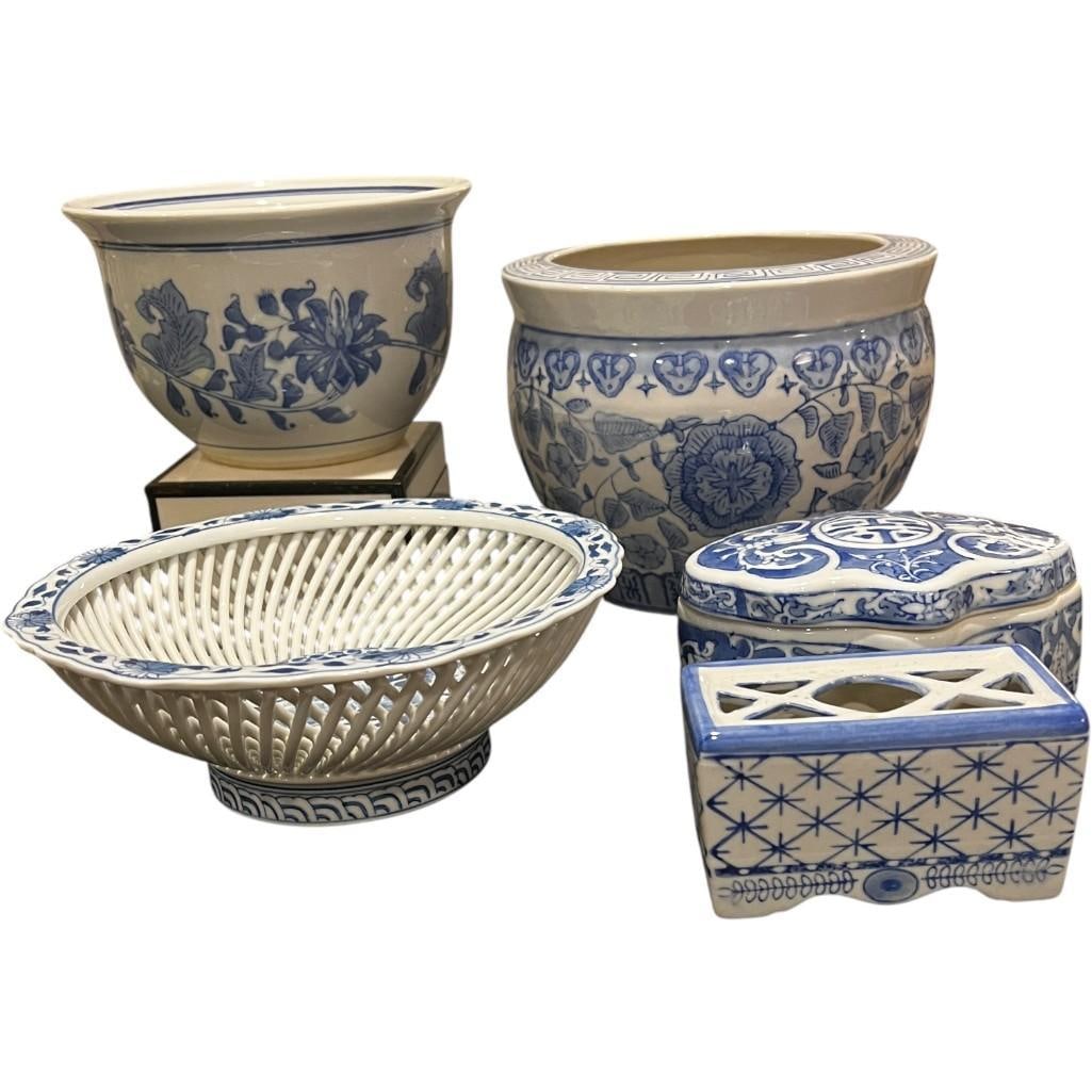 Grouping of Blue and White Chinese Porcelain Decor: Assembled set of 5 blue and white chinoserie style pieces, some signed. Reticulated bowl possibly hand painted. The planters and items vary in size, with dimensions as follows: Reticulated Bowl. 9D x 