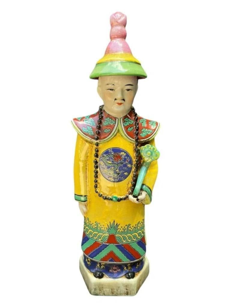 Porcelain Figurine of Chinese Qing Dynasty Emperor: Porcelain statue of a Chinese Qing Dynasty Emperor, capturing the regal presence and intricate details of traditional Chinese artistry. Condition: No cracks, chjips or damage. Dimensions: 15"H X