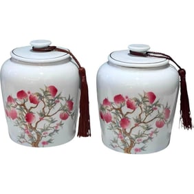 Pair of Porcelain Peach Blossom Canisters
