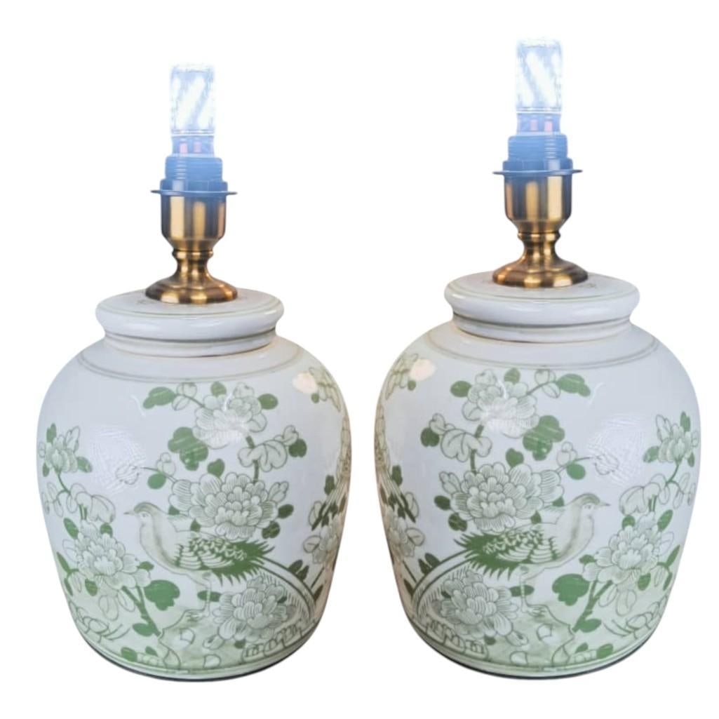 Pair of Hand-Painted Celadon Landscape & Bird Lamps: Pair of Hand-Painted Celadon Landscape & Bird Lamps – Jingdezhen Porcelain Overview: This elegant pair of porcelain lamps is hand-painted in soft celadon green tones, featuring alternating scenic la