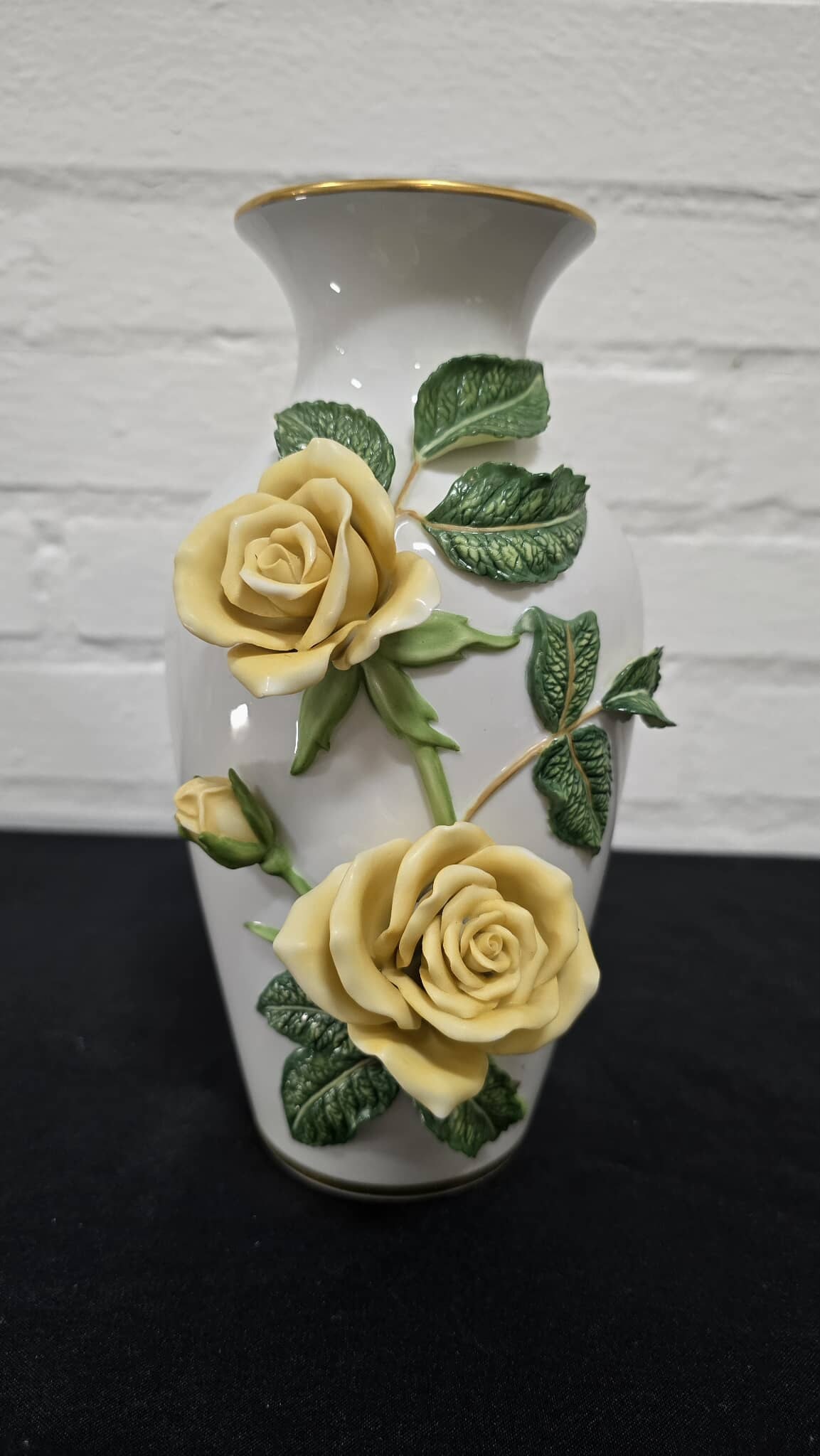 Elegance Rose Vase – Rosanne Sanders – Franklin Porcelain (1985): Charming Elegance Rose vase decorated with delicate sculpted yellow roses and textured foliage. Part of the Rosanne Sanders Franklin Porcelain floral series. Hand-painted with raised floral appliqué