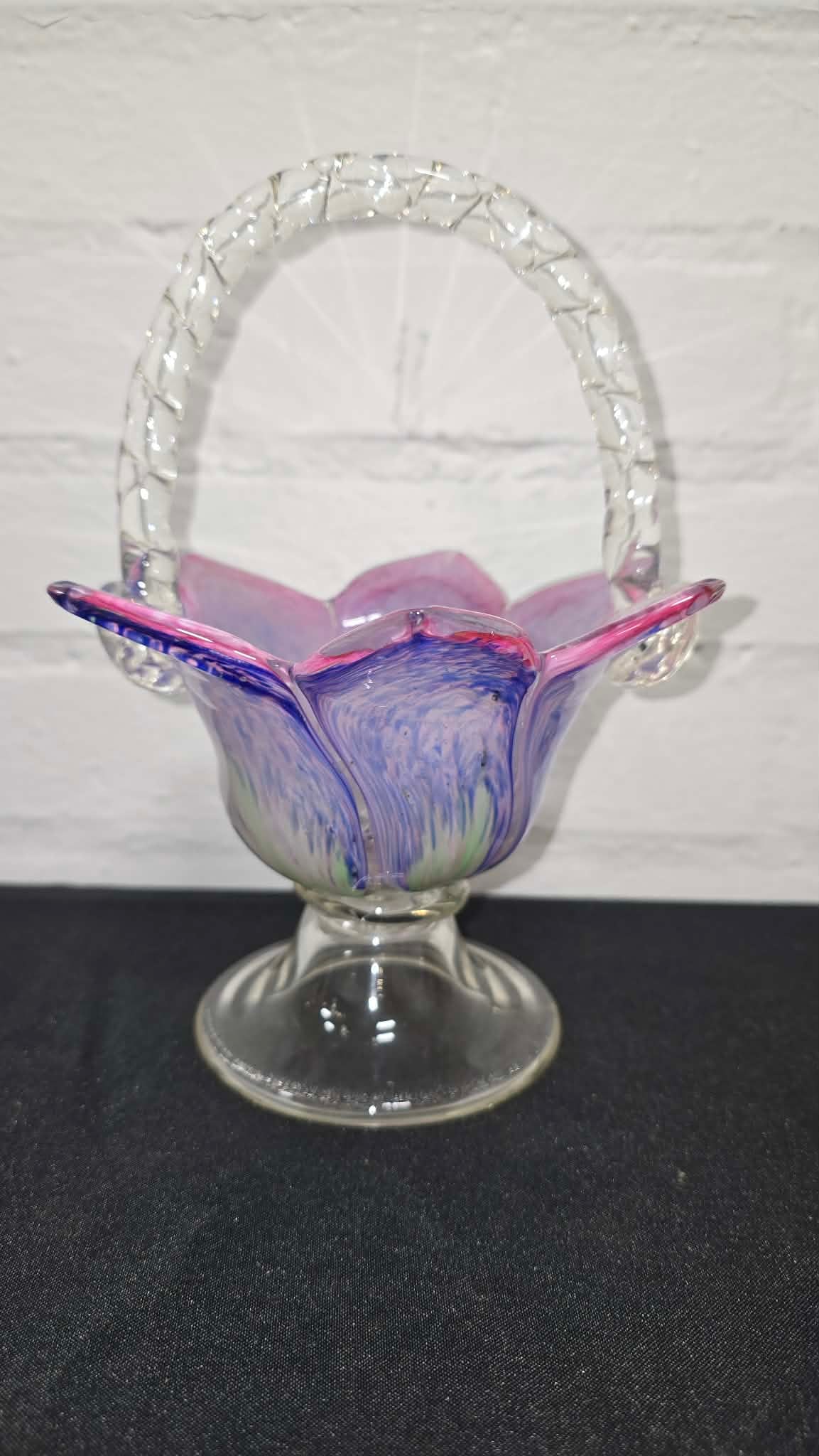Vintage Murano-Style Tulip Basket: Decorative hand-blown Murano-style art glass basket, attributed to Italy, featuring a scalloped, petal-form bowl with swirling blue, lavender, and green glass tones. The basket is accented by a clear 