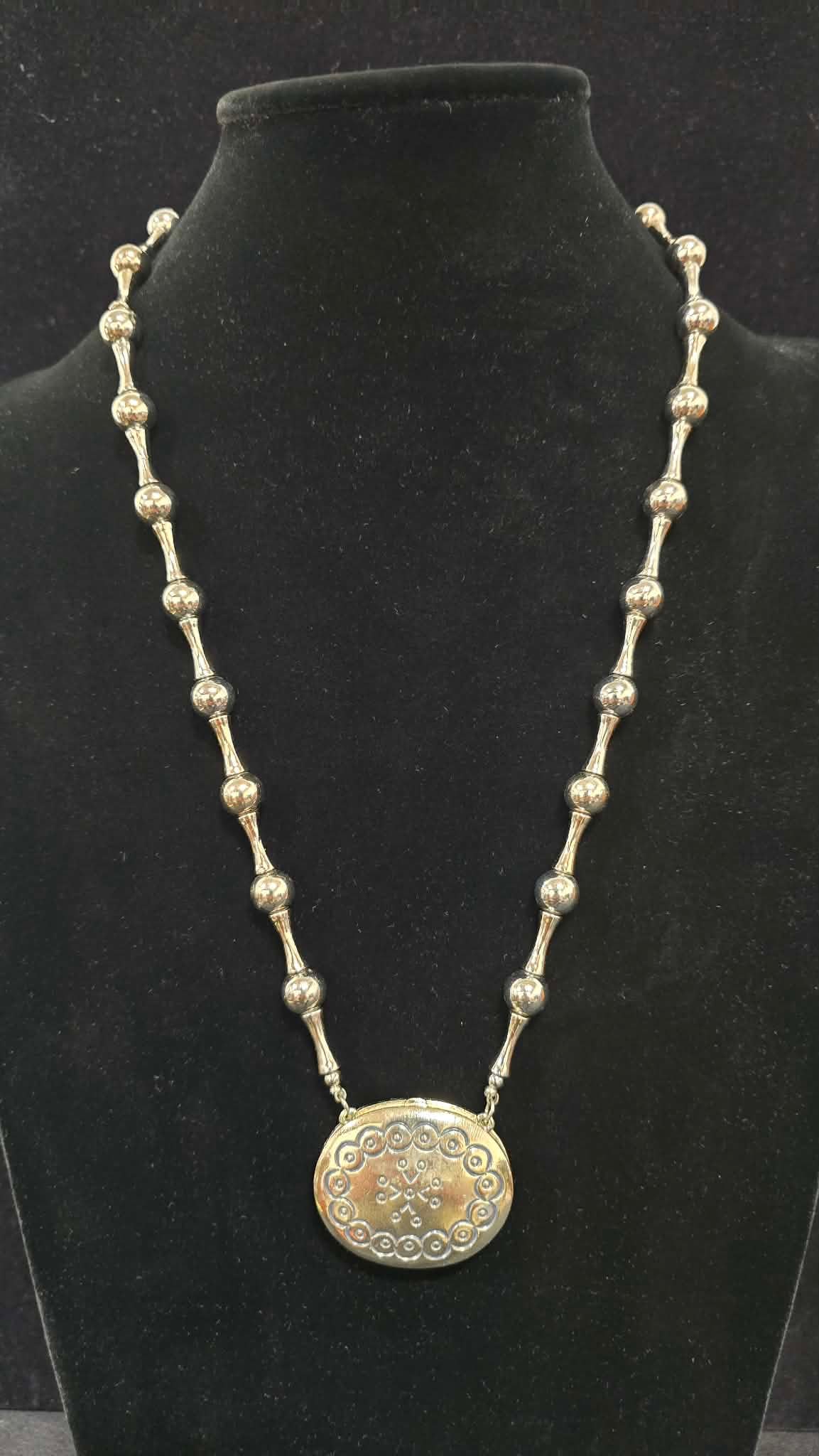 Vintage 1970s Estee Lauder Moonsilver solid perfume locket pendant necklace (1 of 5)