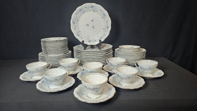 Johann Haviland Bavaria “Blue Garland” Porcelain Dinnerware Set – 59 Pieces: Elegant 59-piece porcelain dinnerware set by Johann Haviland, Bavaria, Germany, in the classic Blue Garland pattern. The set features a delicate blue floral garland motif with platinum trim and