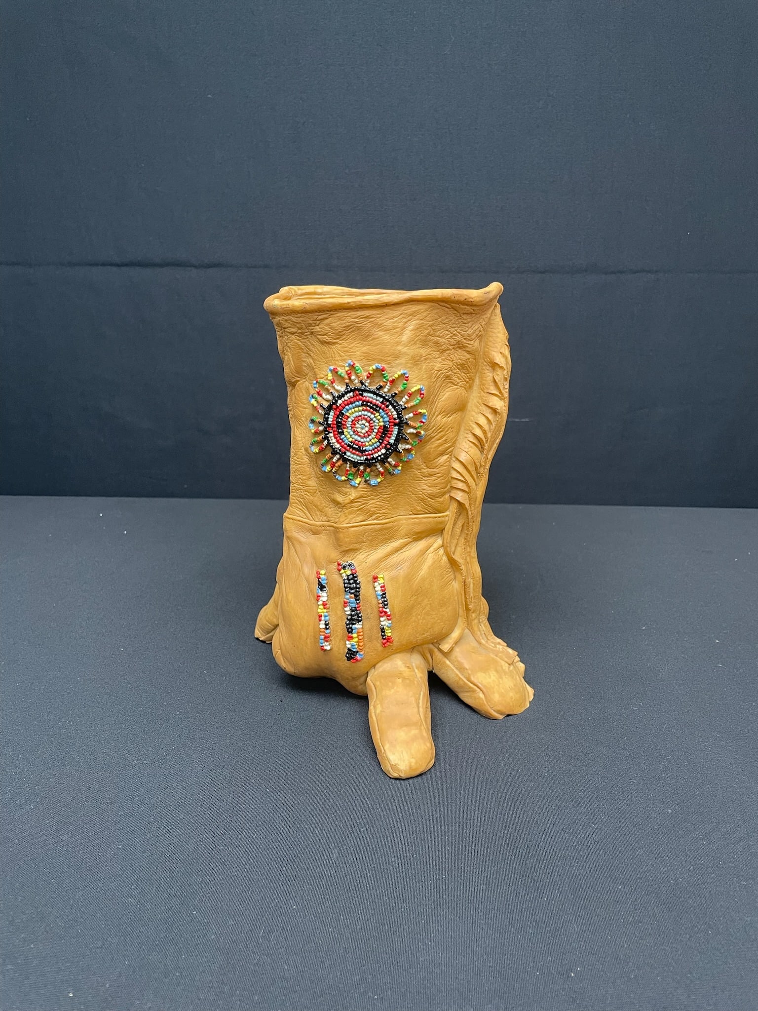 Vintage Montana Beaded Glove Vase: Vintage Montana Beaded Glove made by Montana Silversmith as part of the Montana Lifestyles collection, cast in resin and painted to mimic a Native American leather glove.