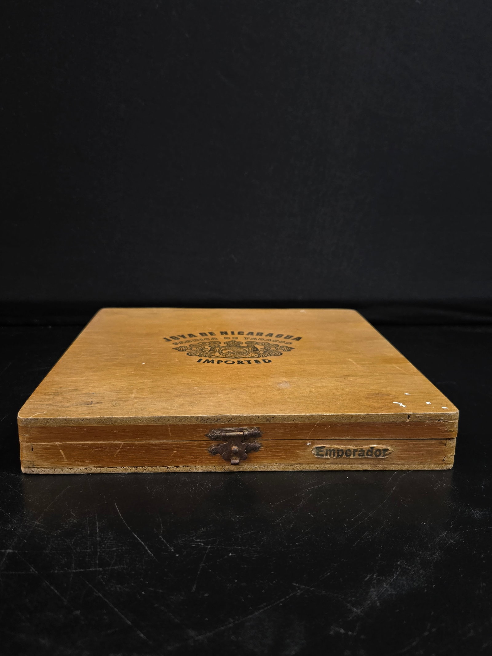 Joya De Nicaragua Cigar Box: Joya De Nicaragua imported wooden cigar box with metal clasp and interior painted design of men in a field harvesting tobacco.