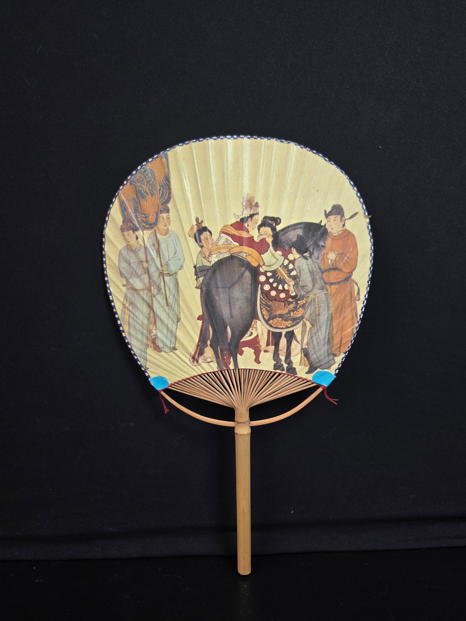 Chinese Fan: Large Chinese fan with traditionally drawn scene of nobility riding with entourage.
