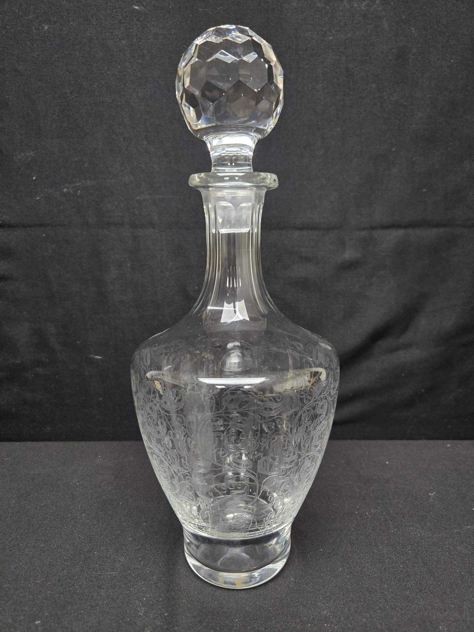 Crystal Decanter With Melon Stopper: Crystal Decanter with spring orchard pattern etched into crystal. Large melon stopper with hexagon pattern.