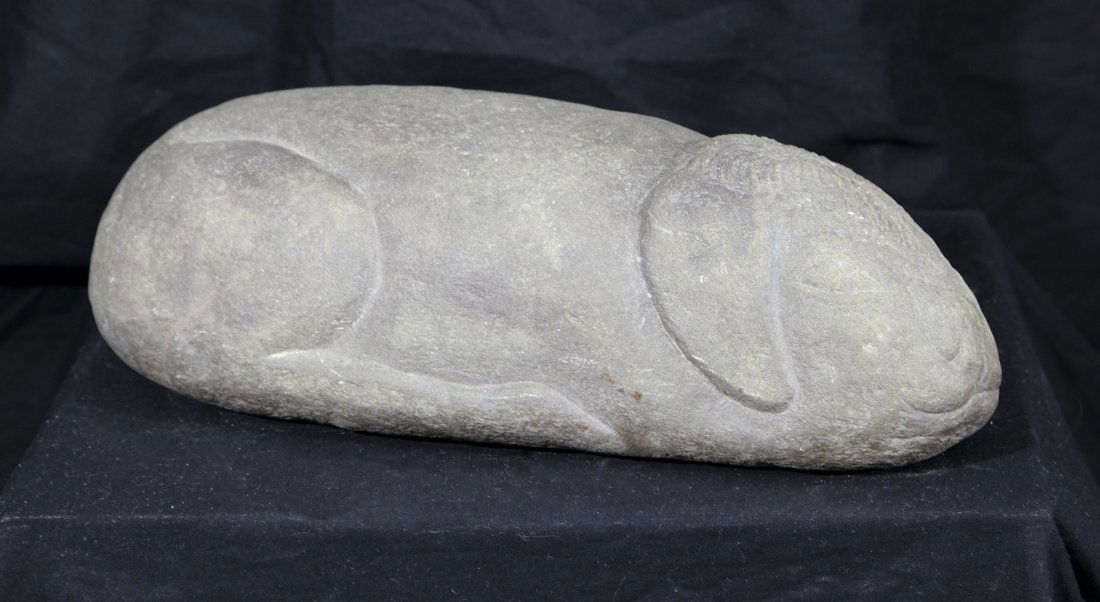 David Marshall (1936-: Dog c. 1980stone4" high x 14" long x 6" widesigned on reversePrivate collection
