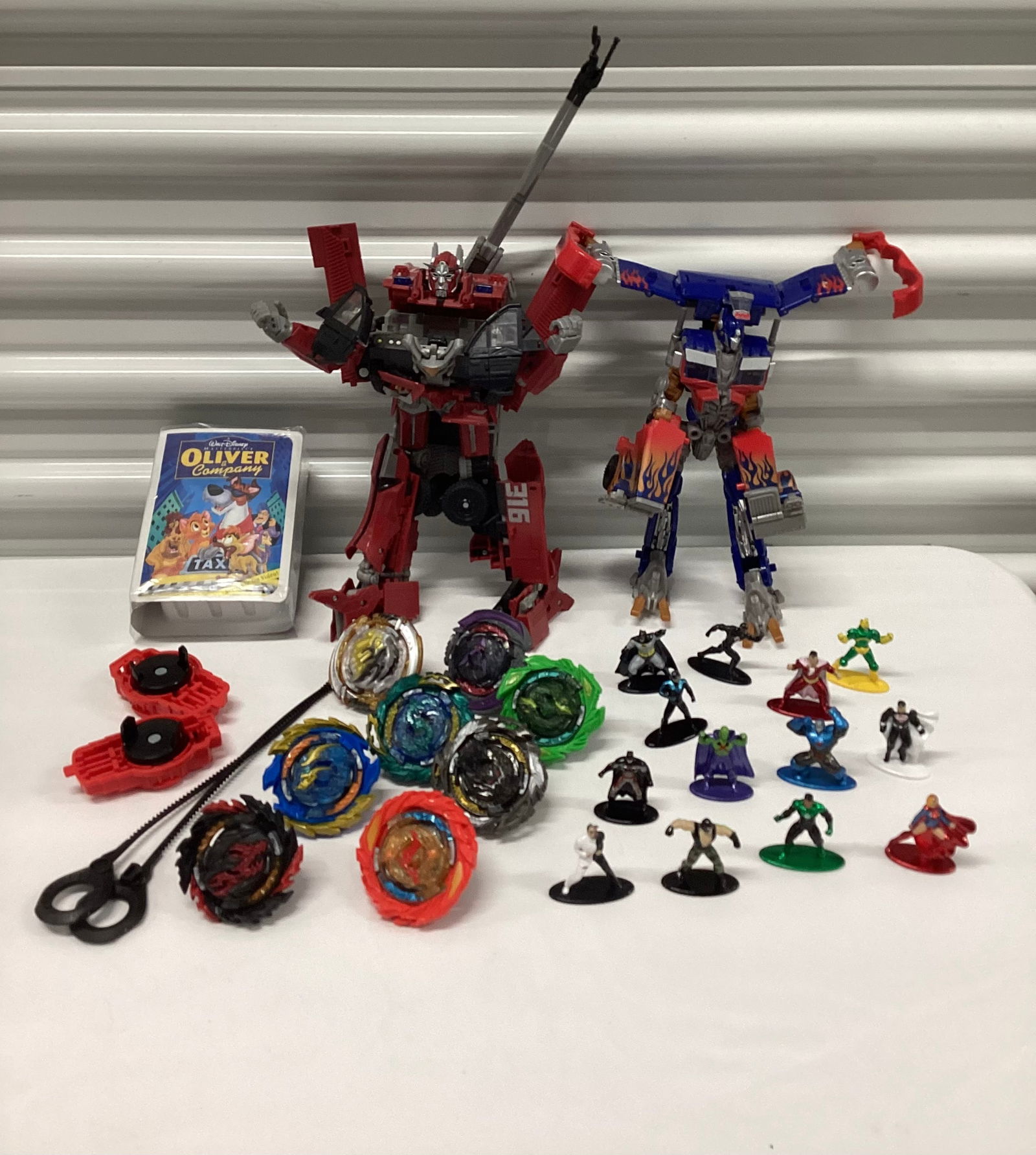 Toy Lot - Transformers, Beyblades, Diecast Mini DC Comics Figures (1 of 4)