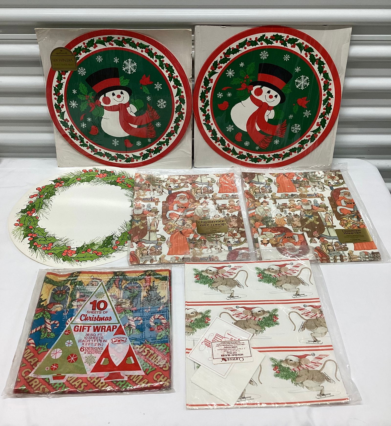 Vintage Sealed Christmas Gift Wrap & Paper Placemats: Three sealed gift wrap, one open Santa with one sheet gift wrap