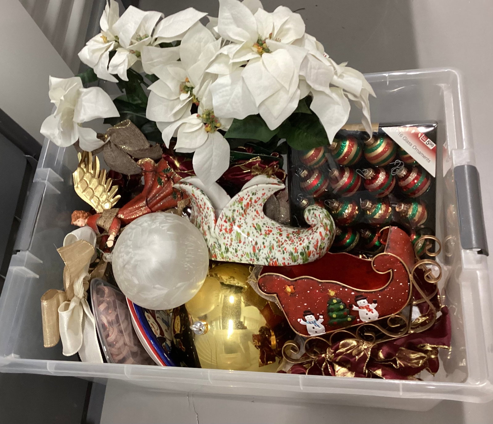 Tote Full of Christmas Items: Ornaments, Sled, Bows..