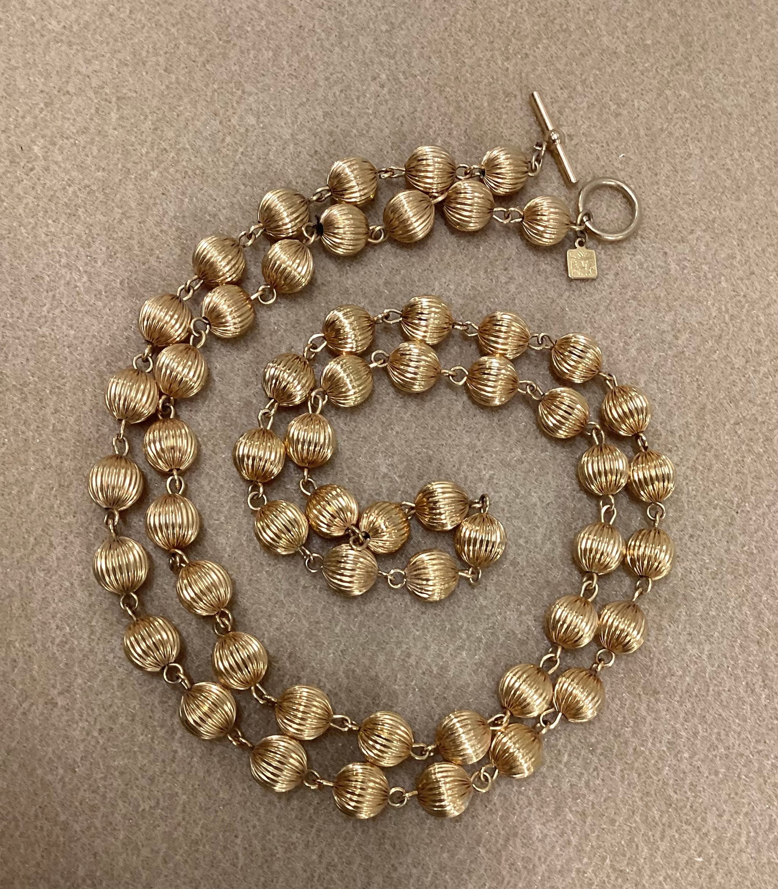 Anne Klein Textured Gold Bead Necklace: 42 inches