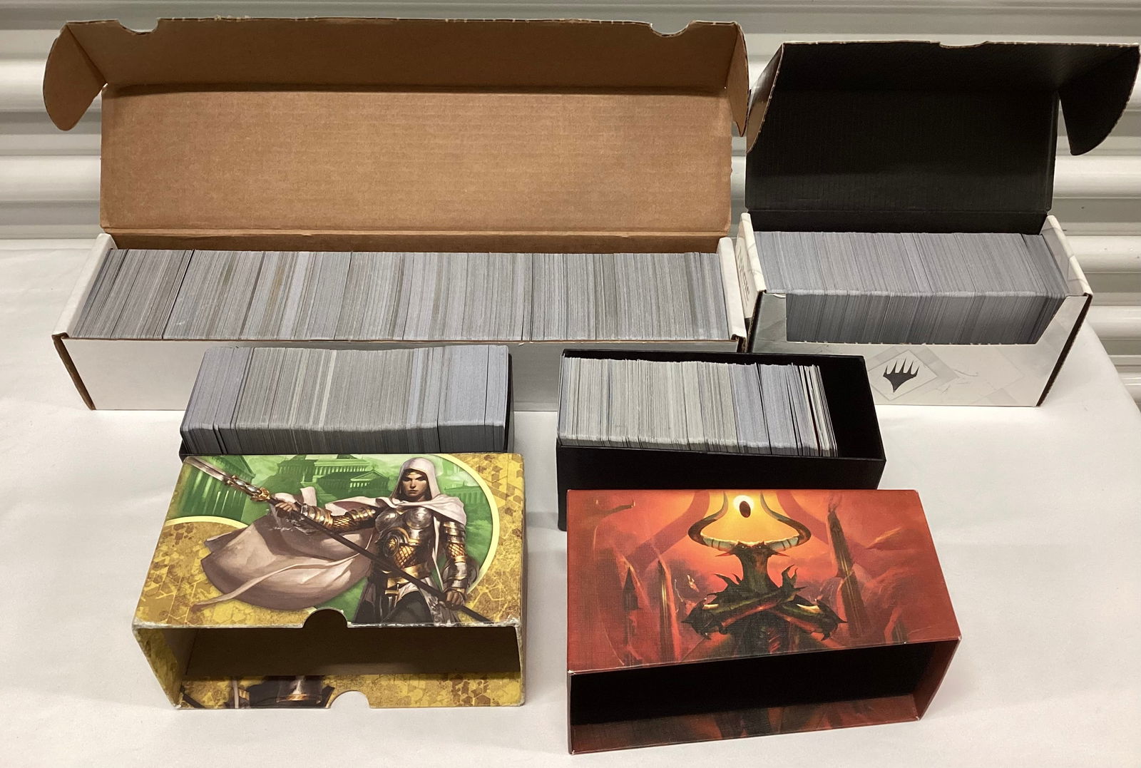 Large Collection of Magic The Gathering Cards: May not match boxes, unsearched, sample shown