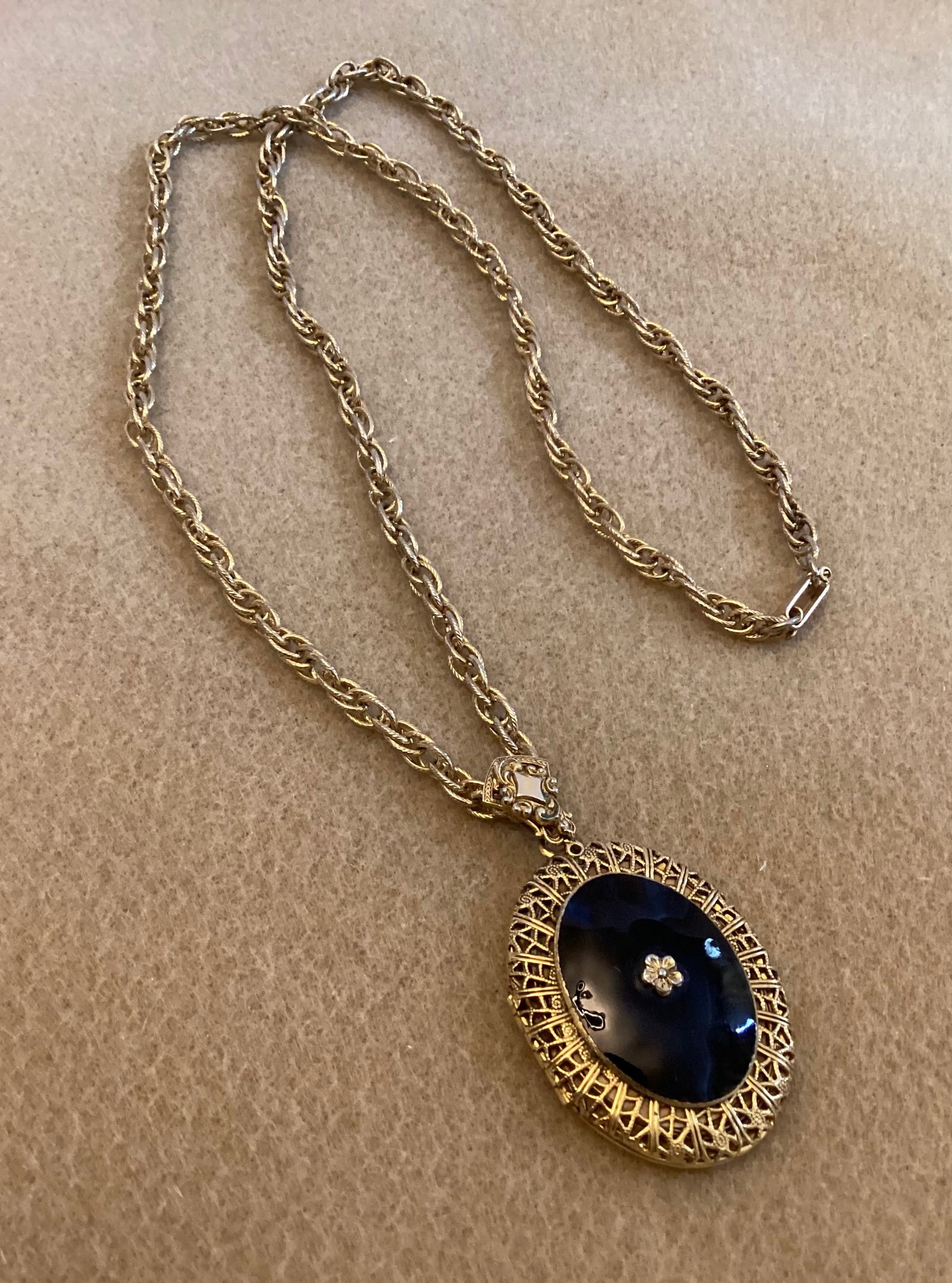 Vintage Locket Necklace: 26 inch chain 2.25 inch Locket